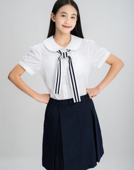 Bộ đồng phục học sinh nữ - Áo cổ lá sen, dây nơ - Váy xanh đen xếp ly